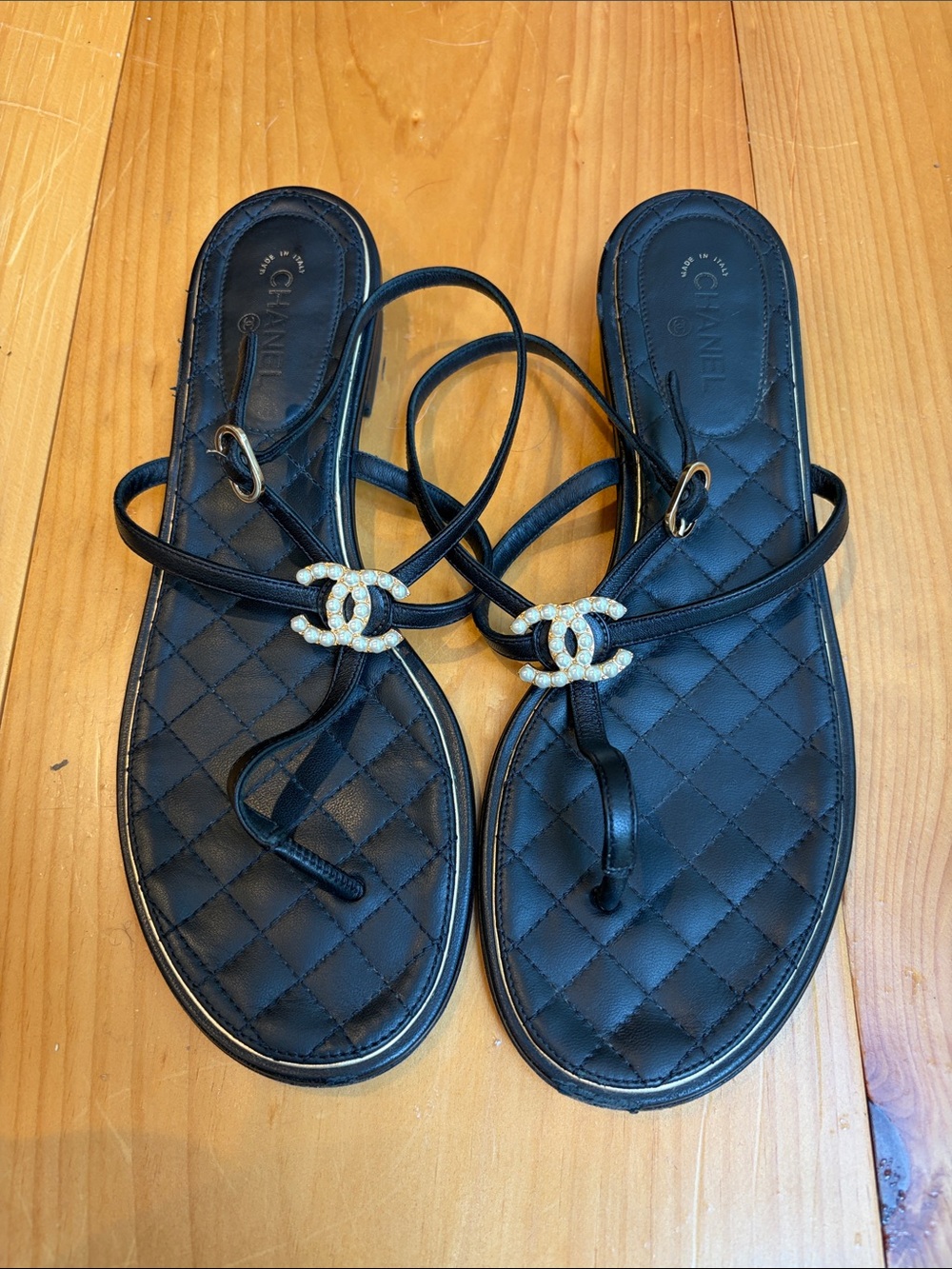 CHANEL Black Quilted Leather CC-Embellished Thong Sandals